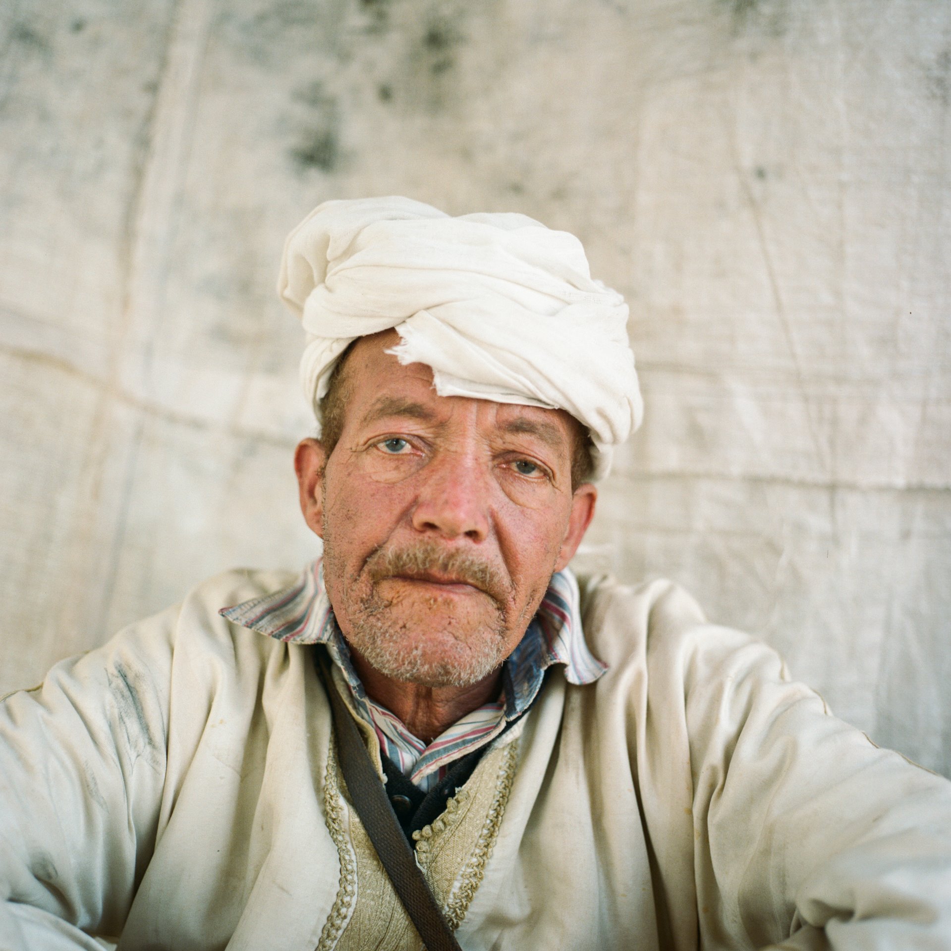 <p>Ahmed Marzak (&ldquo;Hamdani&rdquo;, 62), photographed in Zagora, beside the Oued Draa river in eastern Morocco, has access to several wells. As the traditional khattara (underground canal) irrigation system at Skoura is running dry, farmers have been digging wells to access supply.</p>
