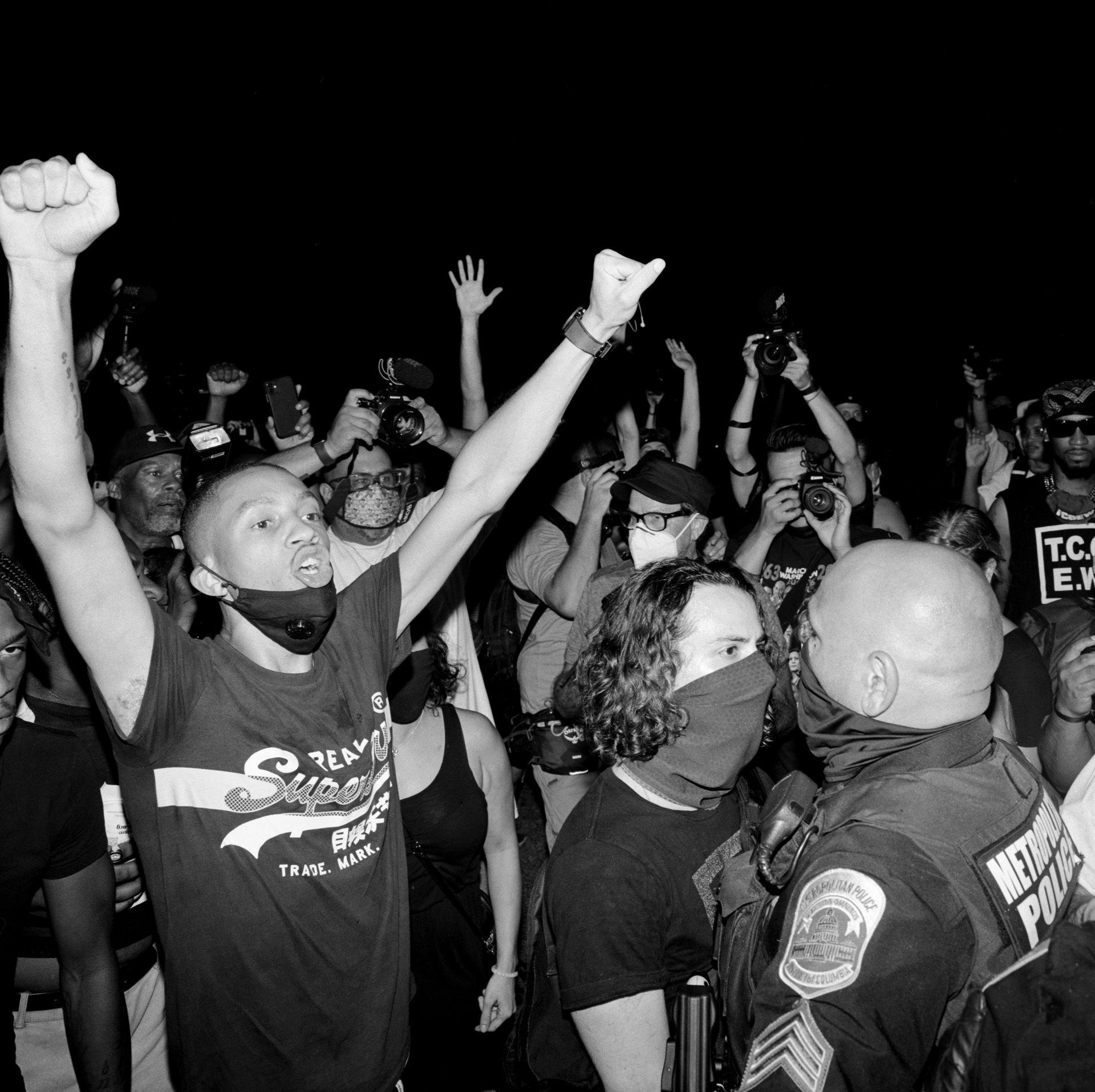 Protesters confront police during a &lsquo;Trump/Pence Out Now&rsquo; rally at Black Lives Matter Plaza, a two-block-long pedestrian section of 16th Street NW in downtown Washington, renamed in June 2020. That night, Trump, breaking a longstanding norm against using federal property for political purposes, accepted the Republican party nomination for president on the South Lawn of the White House.